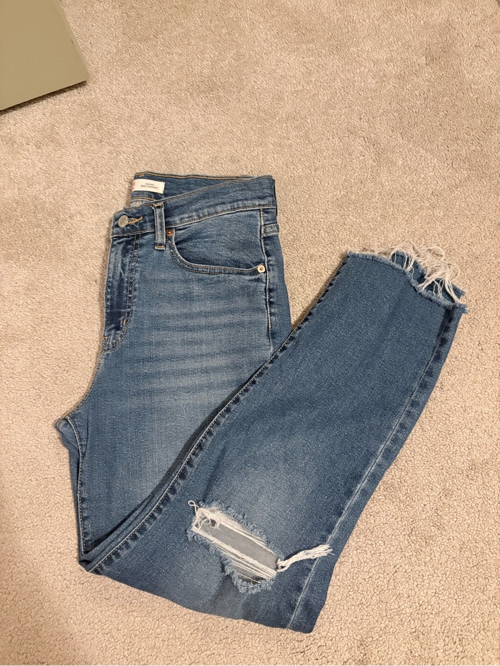 Levi's High-Rise Medium Blue Distressed Straight Jeans